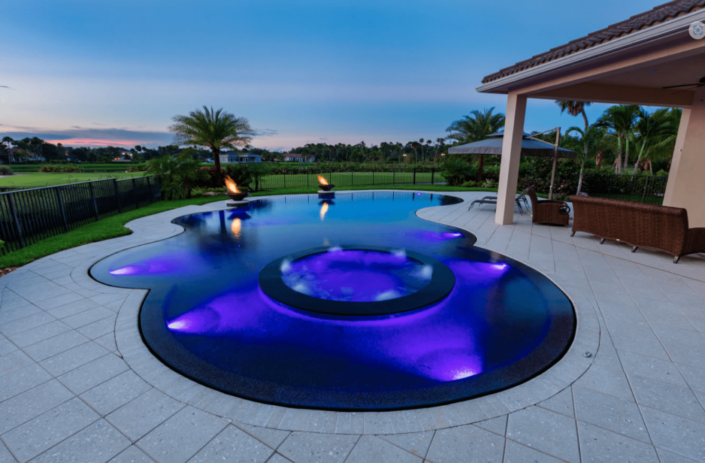 Enhance Your Backyard with Our Freeform Pool Designs